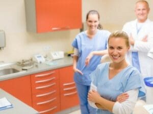 A group of doctors in the operating room.